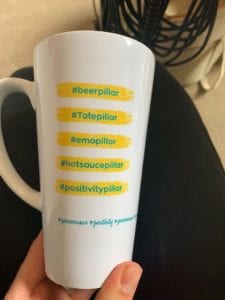 PF branded pillars mug