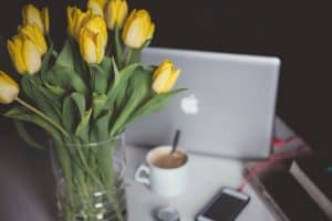 laptop coffee yellow tulips