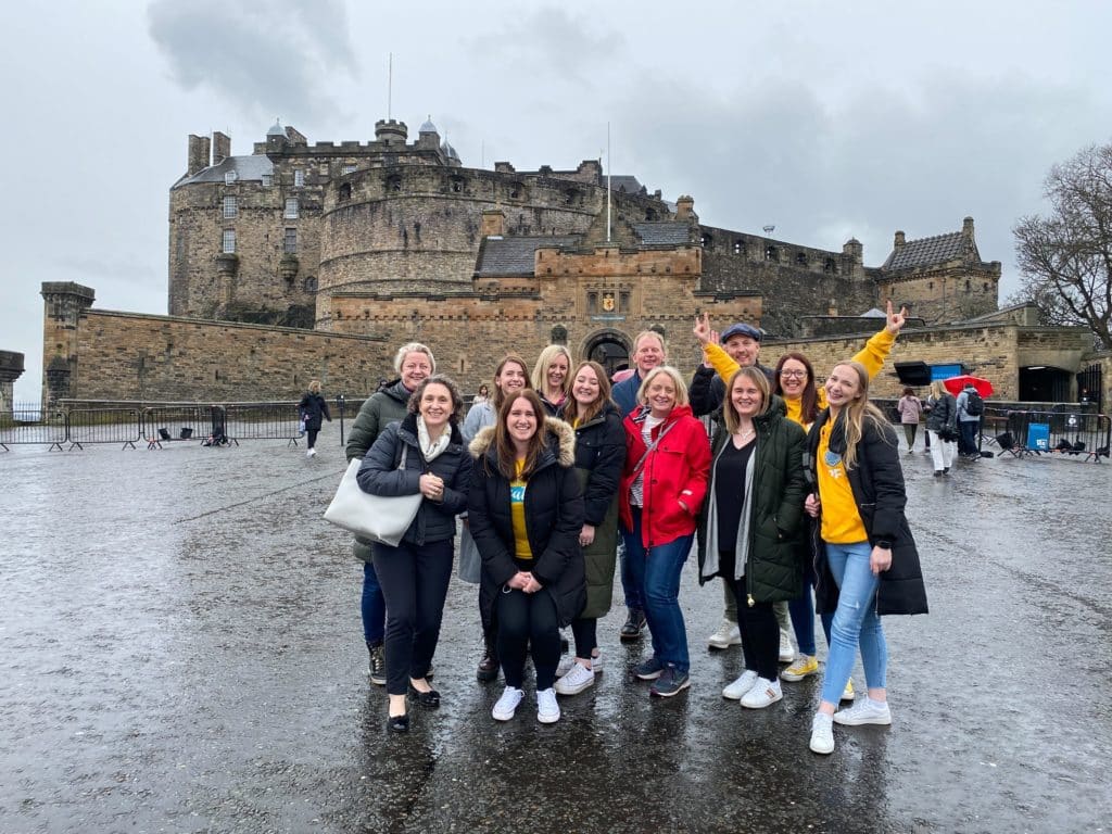 group of people outside Edinburgh castle